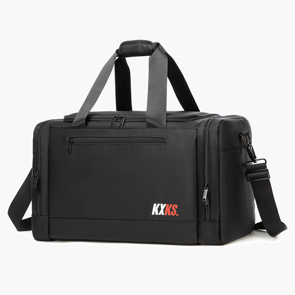 Black duffel bag with KXKS. logo on a white background